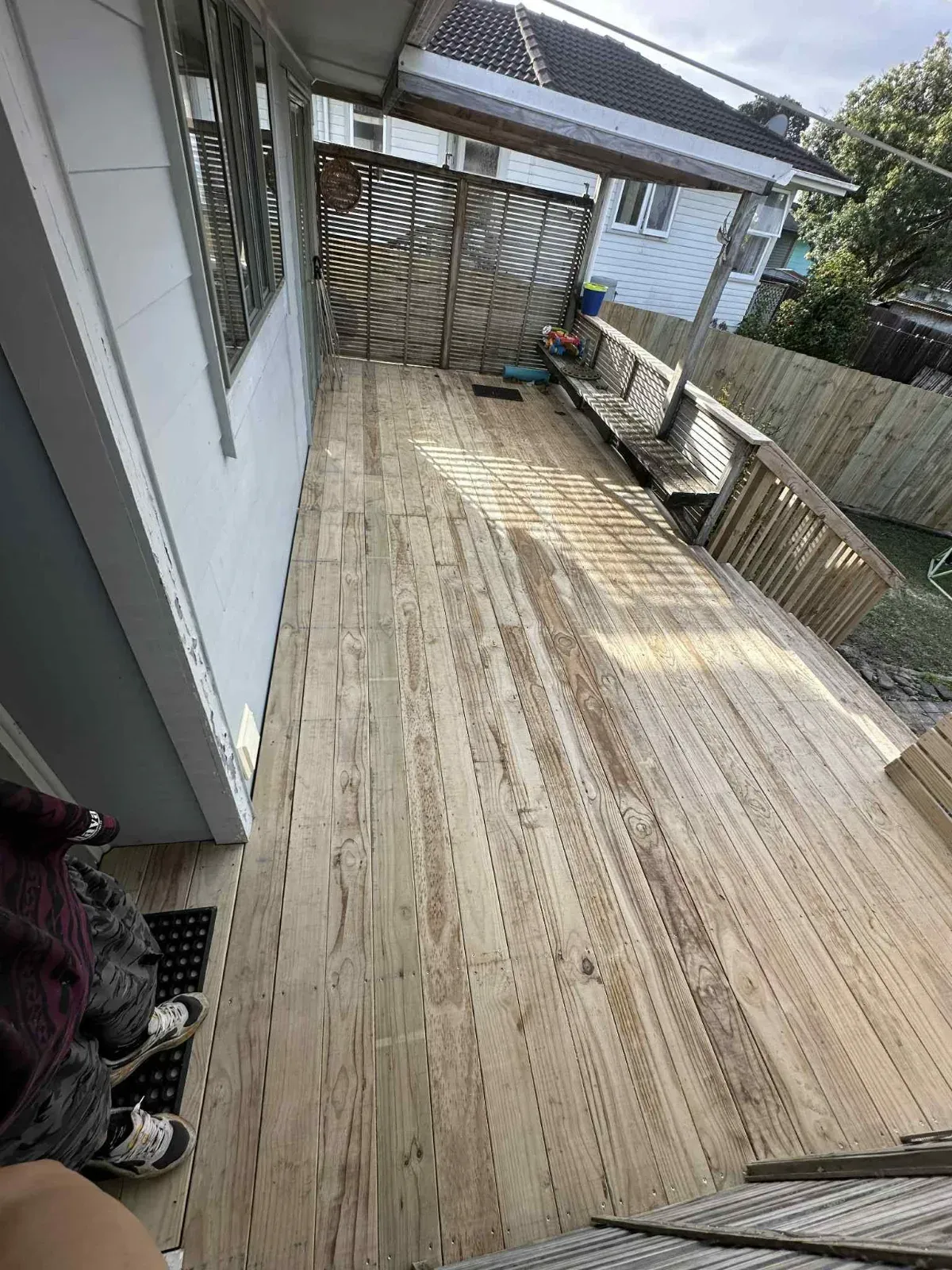 Covered pine deck off a family home, Auckland